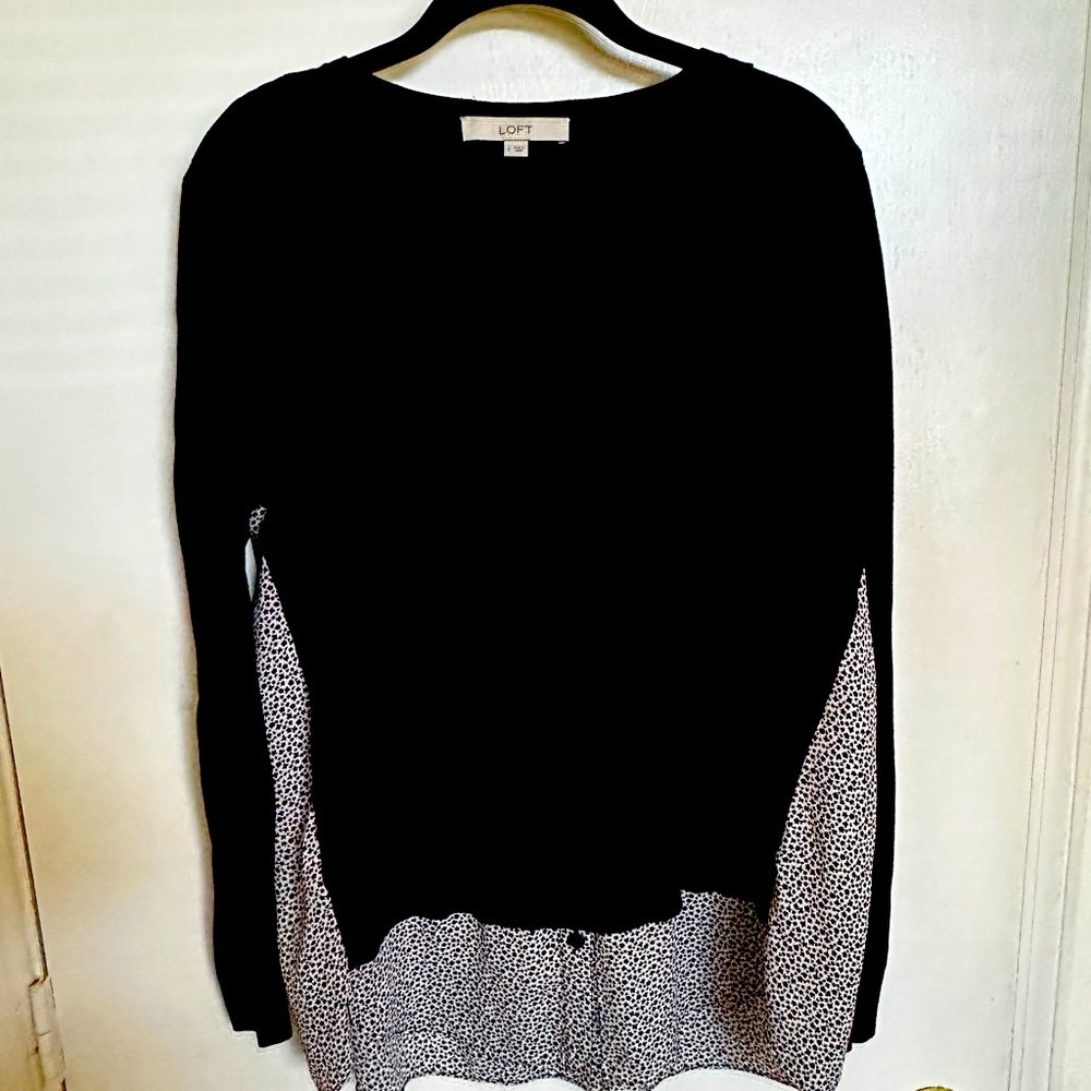 Pullover sweater with peekaboo blouse detail